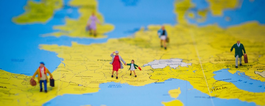 Migration must be thought and solved globally, says political scientist Michael Doyle. toy people on map of europe